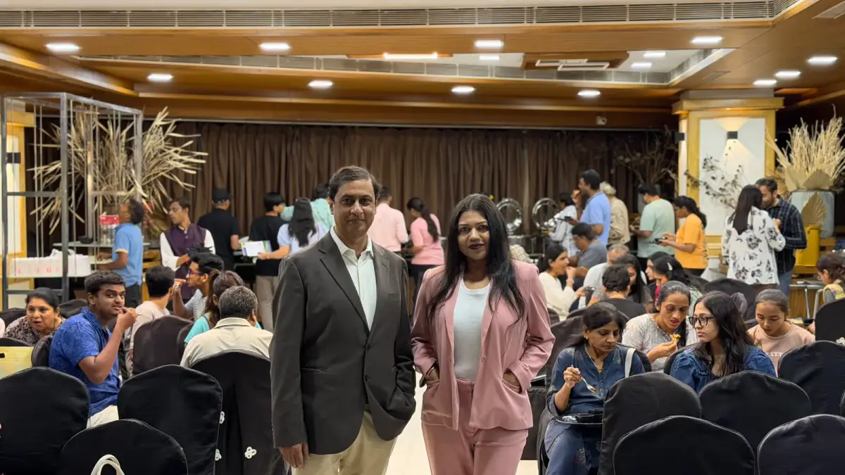 Kishan and Meeta at a student and parent event