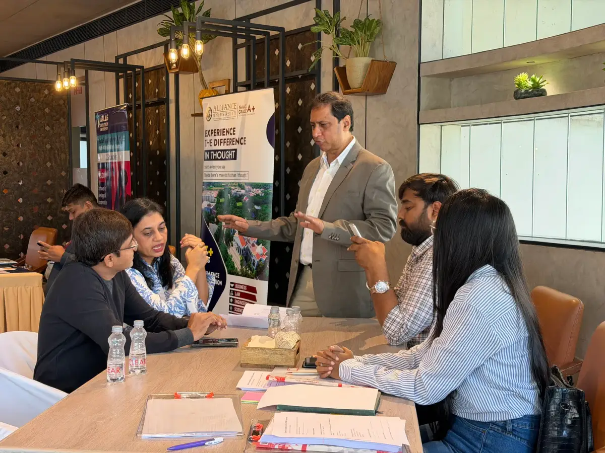 Kishan Patel counselling students at a university admissions session